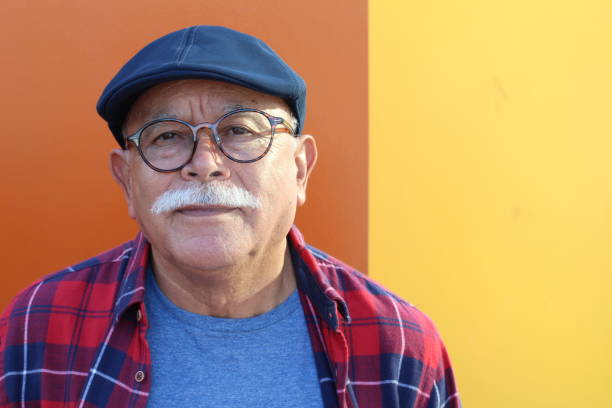istock Pensioner wearing glasses close up 1285988029