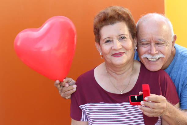 istock Senior couple celebrating their engagement 1285988189