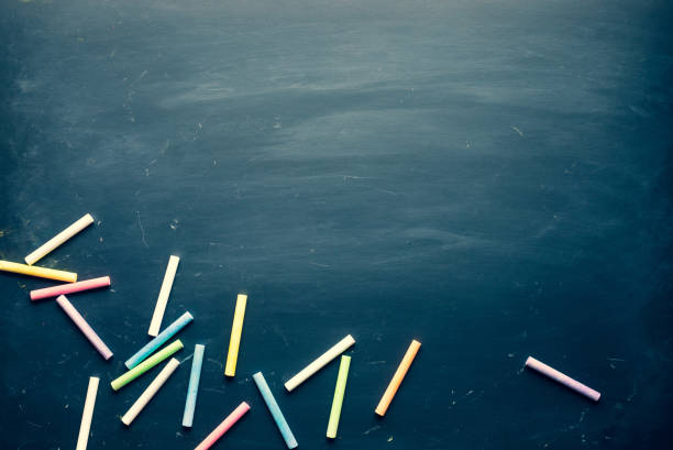 istock Blackboard with color chalk and copy space background.material design. 1285989467