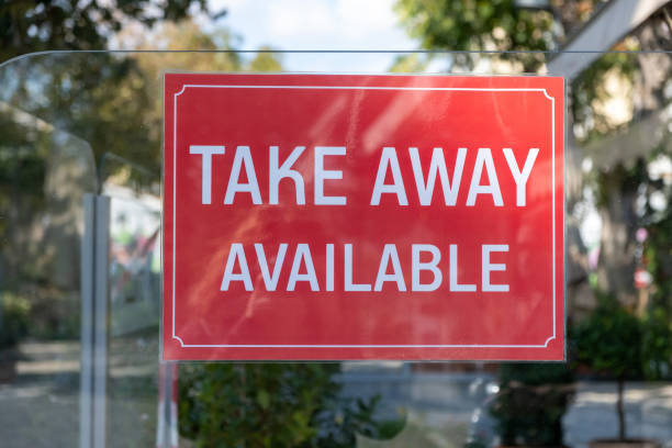 istock Take Away Available sign on restaurant glass partition 1285990431