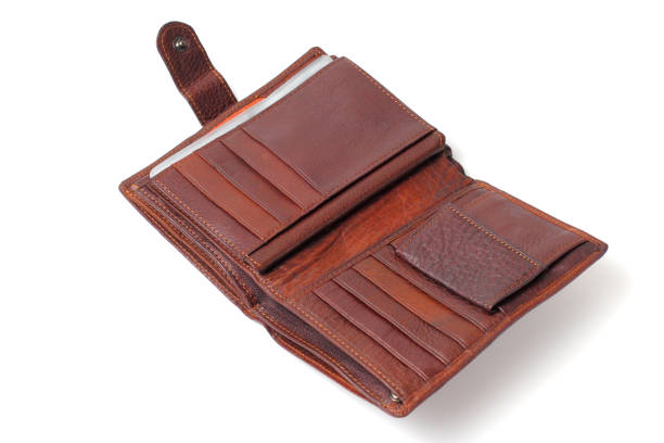 istock Genuine leather wallet, close-up, white background, isolate, many compartments for money, cards and documents 1285991090