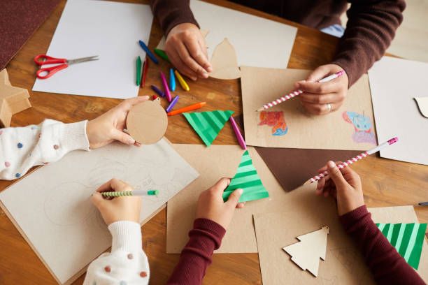 istock Group of Children Making Christmas Cards 1285993334
