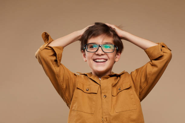 istock Portrait of Carefree Boy in Studio 1285993429