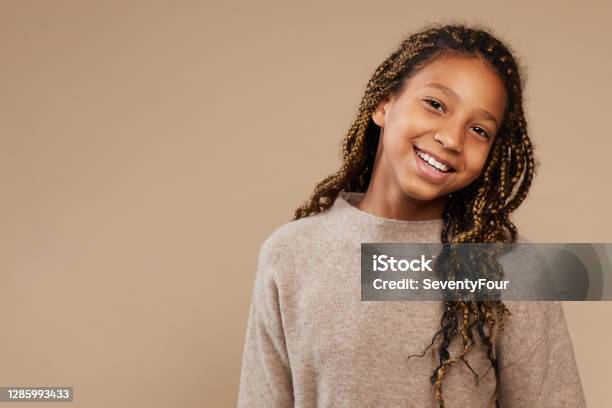 Carefree Africanamerican Girl In Studio Stock Photo - Download Image Now - Child, Teenager, Teenage Girls