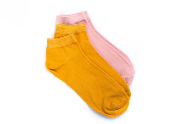 istock two pairs of cheerful colored short socks on a white background, top view 1286002603