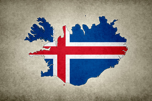 Grunge map of Iceland with its flag printed within its border on an old paper.