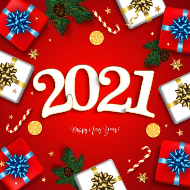 istock appy New Year 2021 greeting card with gifts boxes set with bow. Vector decoration with confetti and gold stars. Christmas typographical background with fir branches and elements. 1286007515