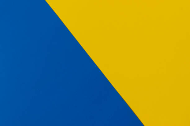 istock Abstract geometric paper background. Blue and yellow colors. 1286009131