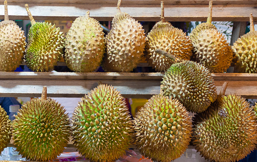 durian fruits at food street. Malaysia. Photo taken in low light at night