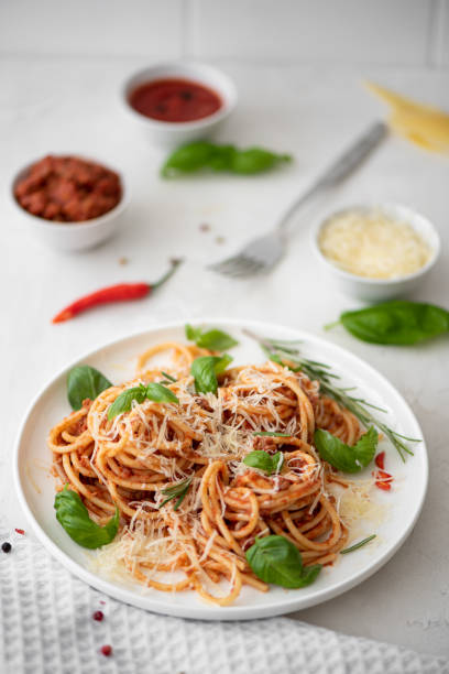 istock spaghetti bolognese with basil and parmesan 1286010662
