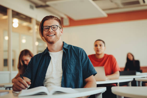 istock Young male student in high school classroom 1286013372