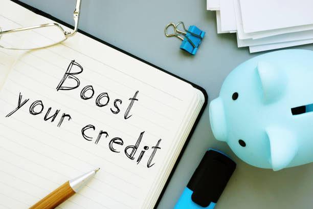 Boost your creditl is shown on the business photo using the text Boost your creditl is shown on a business photo using the text credit score photos stock pictures, royalty-free photos & images