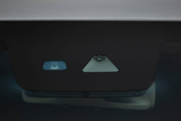 istock Rain and light sensor on the windshield of the car 1286019544