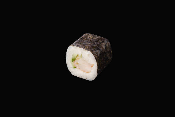 istock hosomaki roll with shrimp and cucumber isolated on black 1286020829