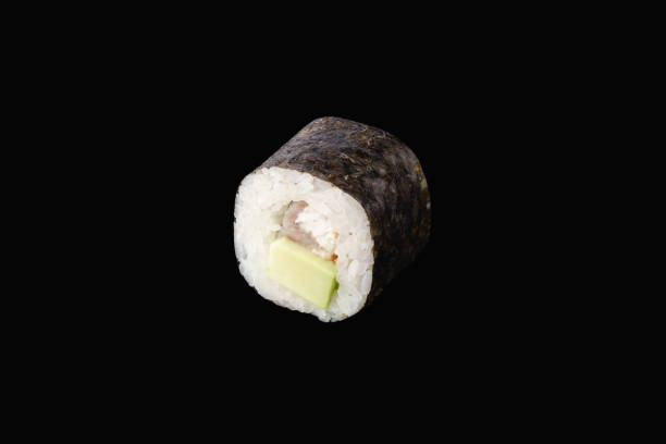 istock hosomaki roll with eel, avocado isolated on black 1286020860