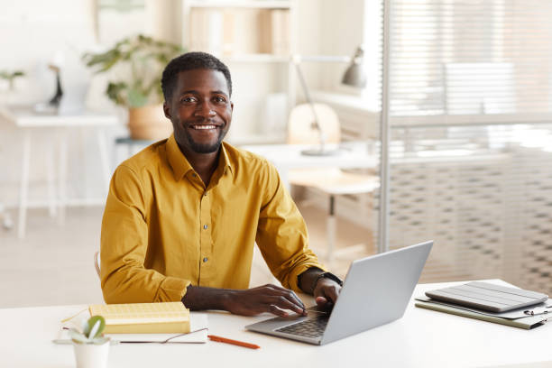 istock Smiling African-American Man in Office 1286022812