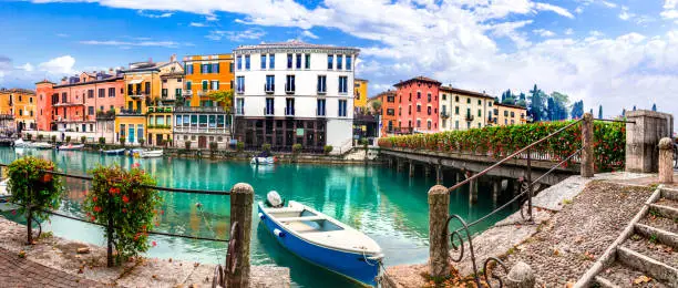 Photo of Peschiera del Garda - charming village with colorful houses in beautiful lake Lago di Garda. Verona province, Italy