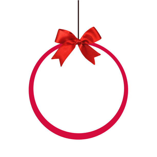 istock Round holiday frame with red silk bow isolated on white background 1286027588