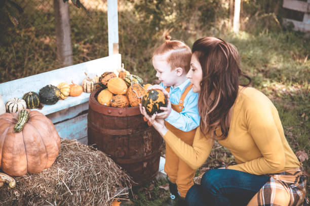 istock Mother and little son on their farm 1286028415