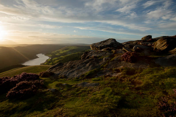 Sunset over Derwent Edge Sunset over a beautiful summers day at Derwent Edge in the Peak District, Derbyshire peak district national park photos stock pictures, royalty-free photos & images