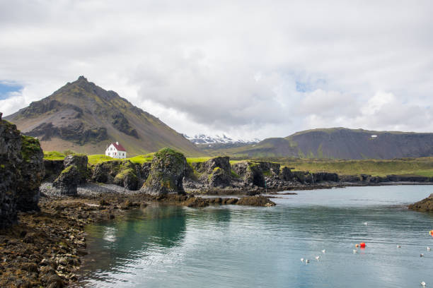 istock Coastline of Arnarstapi in Snaefellsnes peninsula in Iceland 1286033614