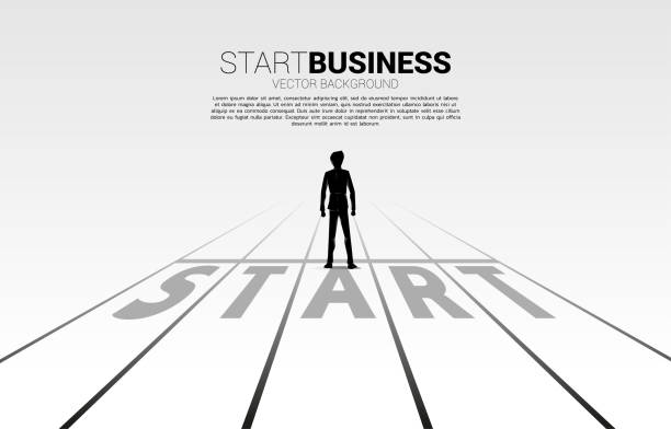 istock Silhouette of businessman standing at start line. 1286033780