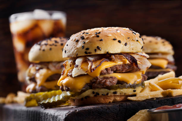 Double Cheese Burger Sliders with Fried Onions, Pickles on a Brioche Sesame Seed Bun