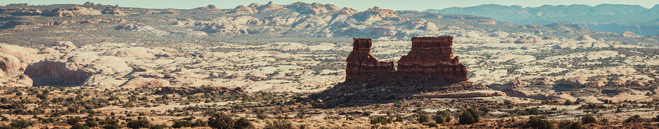Large rock formation  standing alone in Arches National Park.