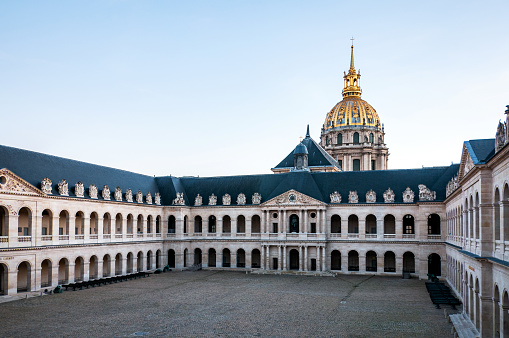 Sunset on Les Invalides court of honor empty, during second wave and second coronavirus lockdown in Paris, in autumn. Paris in France. November 12, 2020
