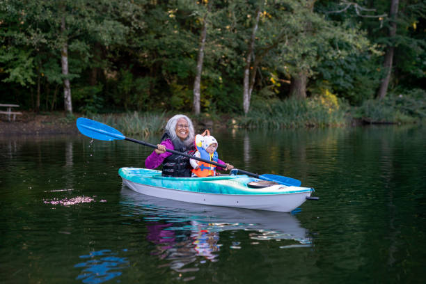 istock Pacific Islander grandmother kayaking with grandchild 1286048405