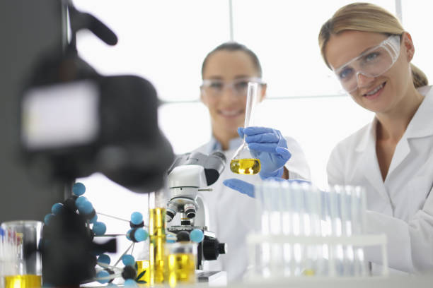 istock Two researchers are filming experiments in laboratory on camera 1286048715