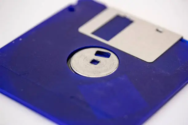 Close up of old blue floppy disk