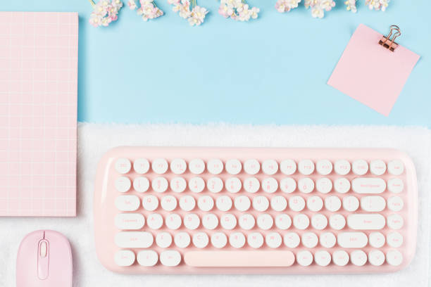 istock flat lay pink stationery on work desk in blue pastel background 1286054873