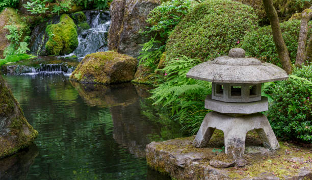 istock Lantern Waters Edge Includes Waterfall Japanese Garden Oregon Panoramic 1286056013