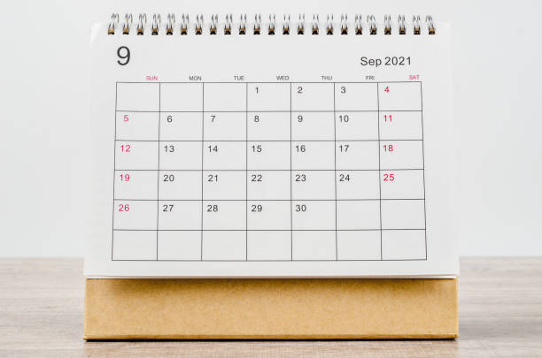 September 2021 Calendar desk for organizer to plan and reminder September 2021 Calendar desk for organizer to plan and reminder on wooden table. september calendar stock pictures, royalty-free photos & images