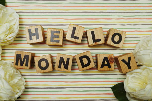 istock Hello Monday alphabet letters on colorful stripes background 1286064645