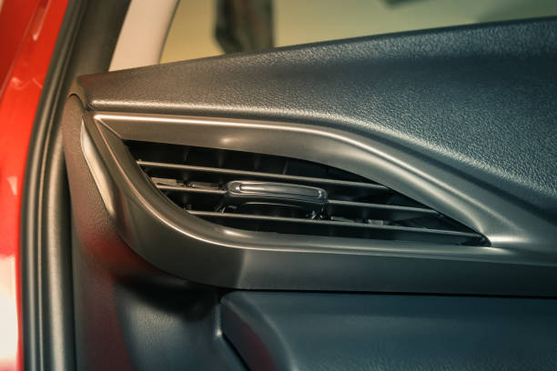 istock Front Air Vent in Car Interior on Zoom View in Vintage Tone 1286070288