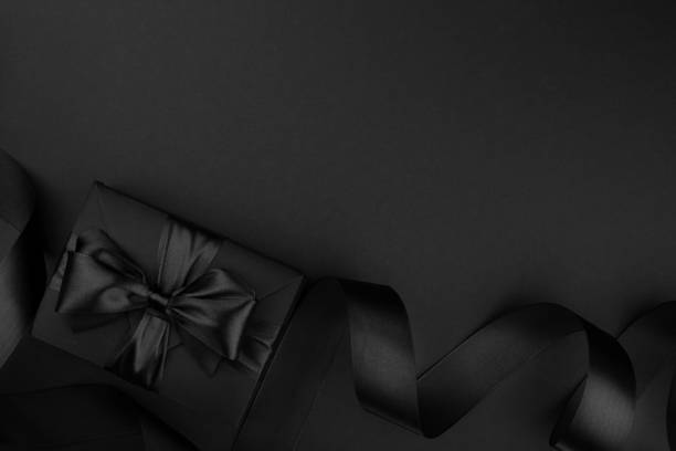 istock Black friday sale background with gift 1286070968