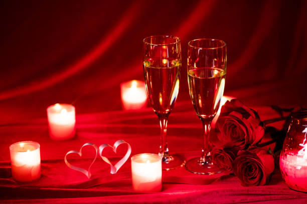 istock Champagne glasses and candles 1286074896
