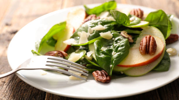 istock spinach salad with apple, parmesan and cashew nut 1286077459