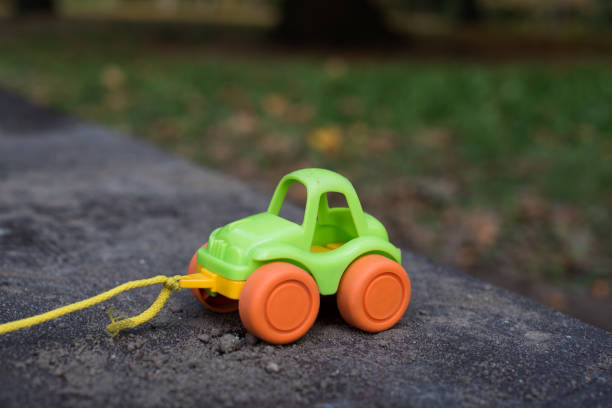 istock colourful toy car on the road 1286078588