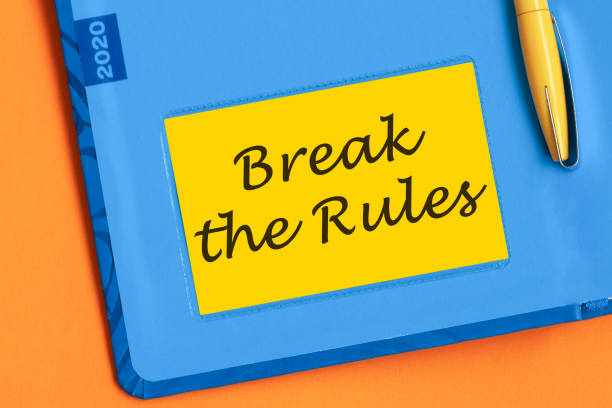 istock Break the rules the word is written in black letters on the yellow paper for notes. 1286080036