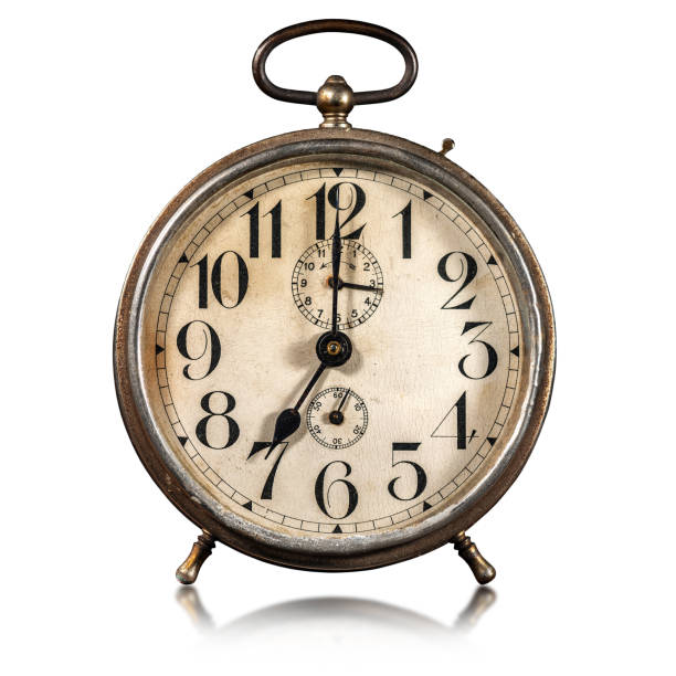 istock Old Alarm Clock Isolated on white Background - Seven o'clock 1286083759