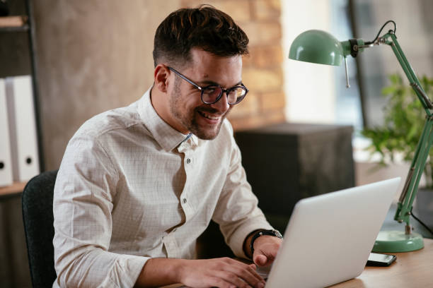 istock Businessman working in the office on his laptop. 1286092724