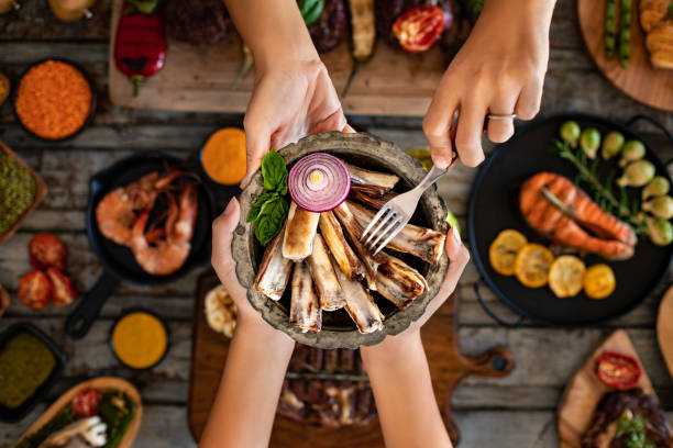 istock Different kinds of grilled meat on the table at the restaurant. 1286095708