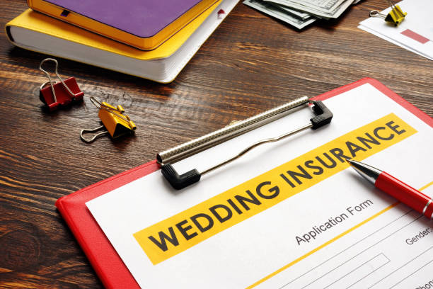 istock Empty Wedding Insurance form and pen for signing. 1286097185