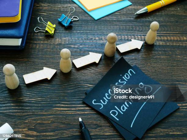 Succession Planning And Figurines With Arrows Stock Photo - Download Image Now - Planning, In A Row, Business
