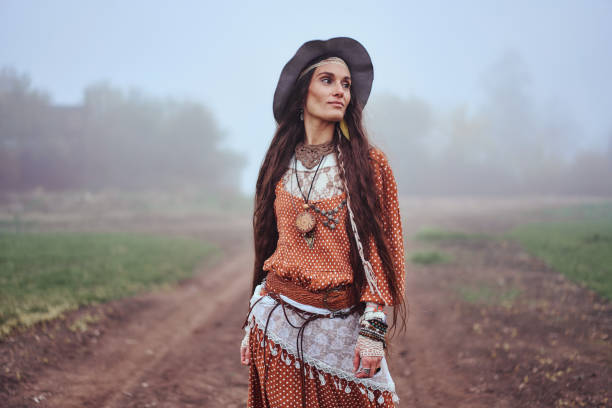 Beautiful hippie girl on nature. Boho fashion style. Freedom lifestyle