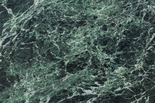 istock The dark green marble. Facing stone. Texture 1286100466