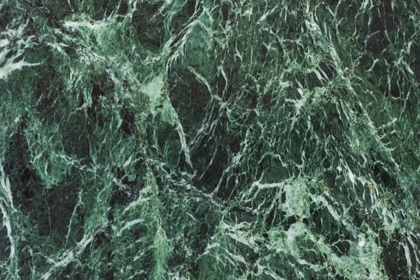istock The dark green marble. Facing stone. Texture 1286100531